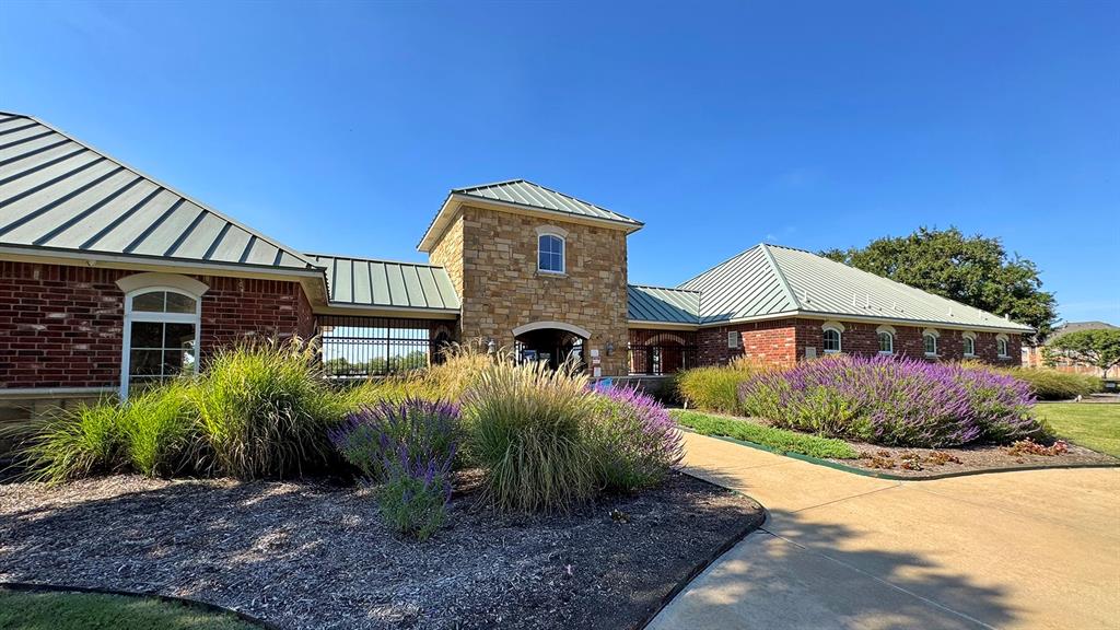 1113 Seguin Road Forney, TX 75126 - Photo 29 of 32 a front view of house with yard and green space