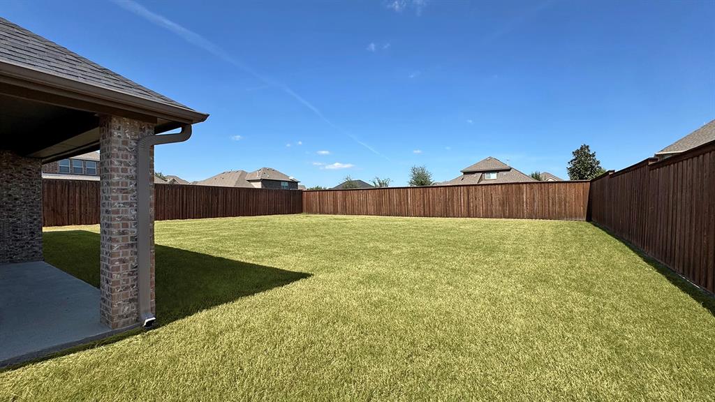 1113 Seguin Road Forney, TX 75126 - Photo 3 of 32 a view of a backyard