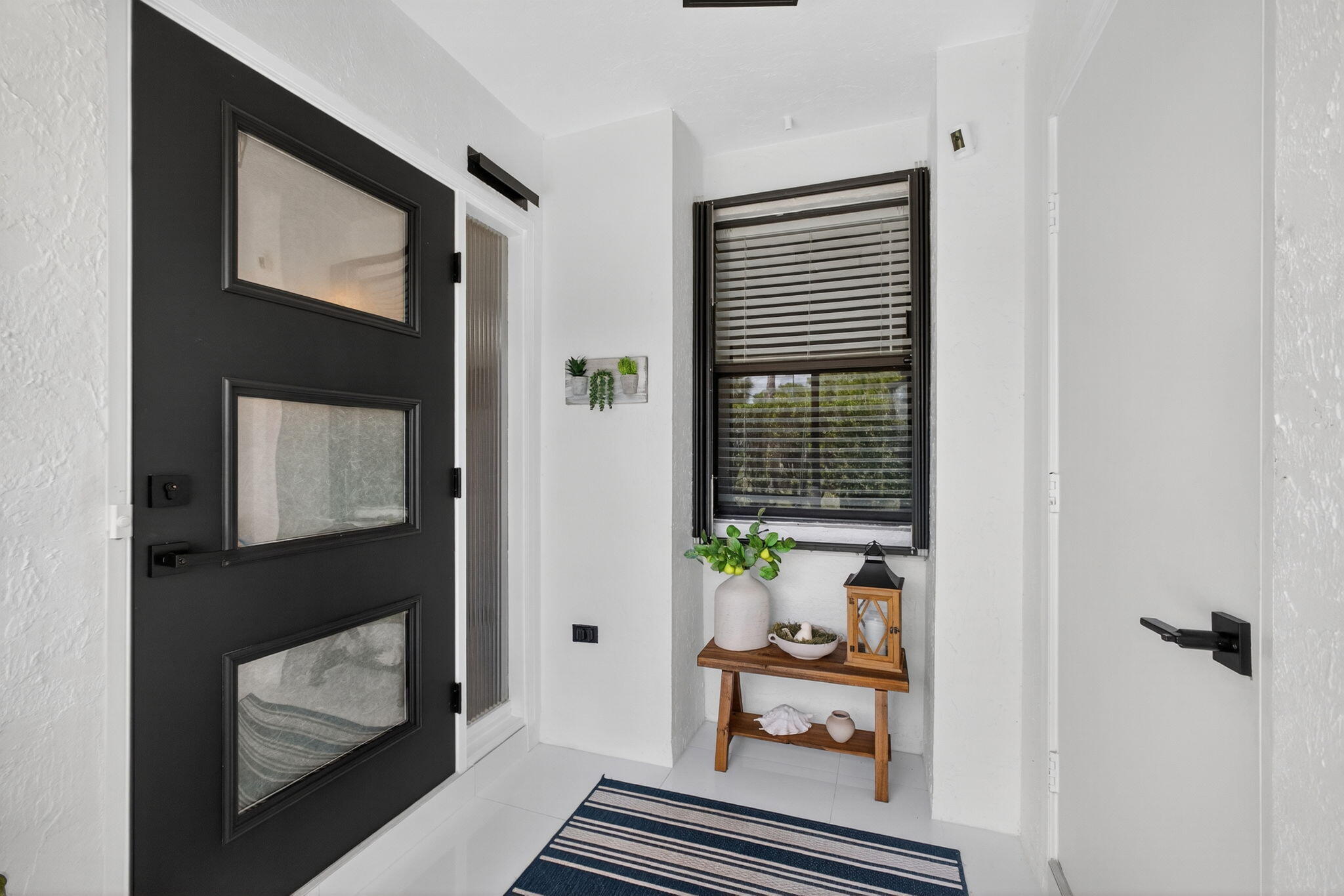 101 Half Moon Circle, Unit B Jupiter, FL 33458 - Photo 3 of 44 Upgraded Entrance