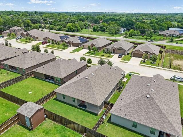 1223 Trevino Road Forney, TX 75126 - Photo 15 of 20 an aerial view of a house with a garden and lake view