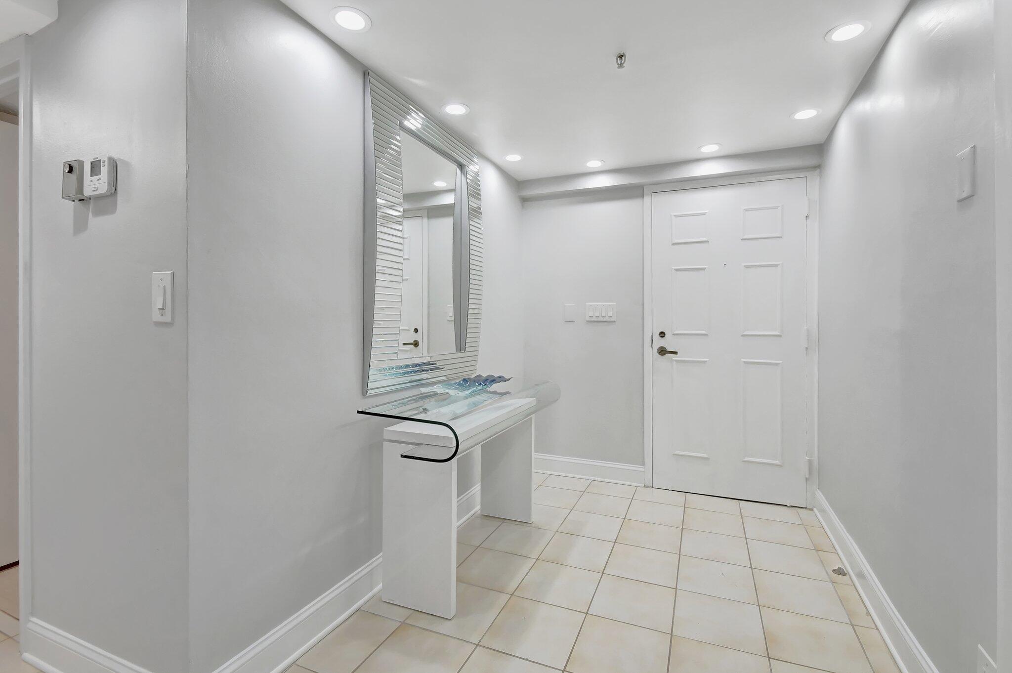 7201 Promenade Drive, Unit 302 Boca Raton, FL 33433 - Photo 3 of 46 foyer