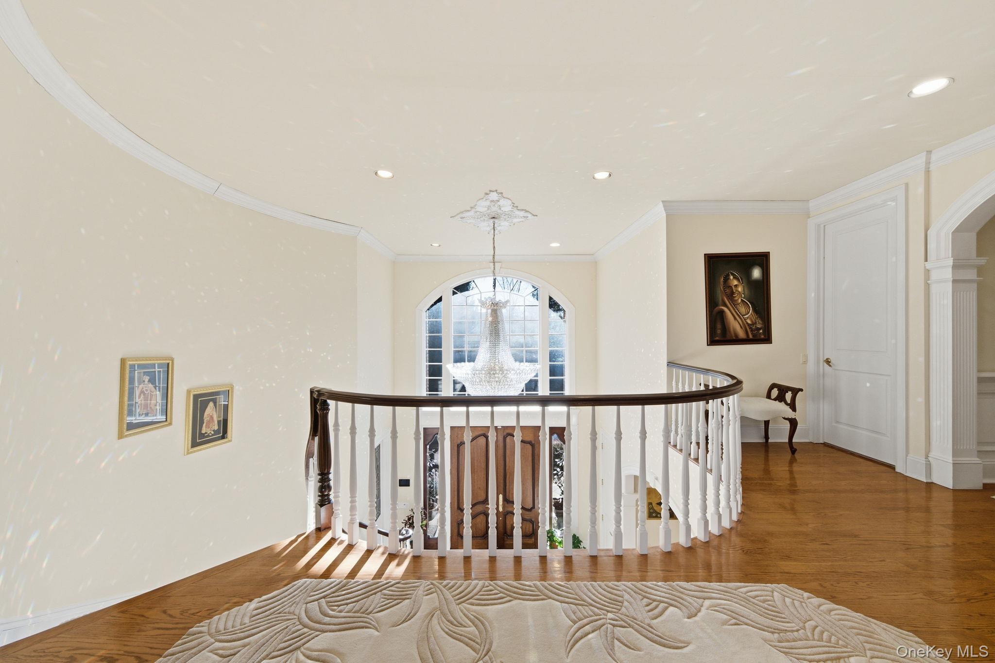 19 Cobblestone Court Centerport, NY 11721 - Photo 23 of 45 a view of entryway with wooden floor