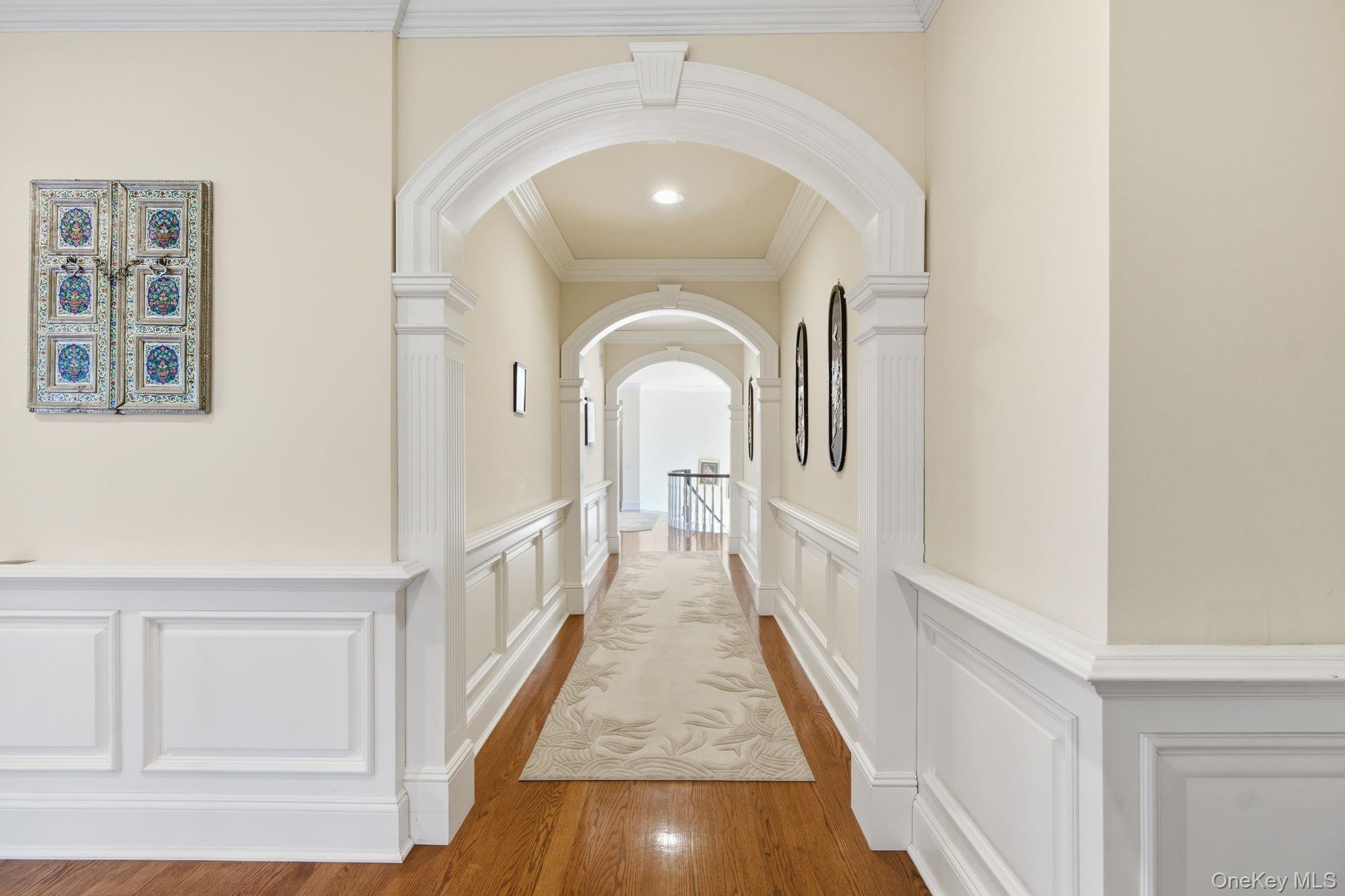 19 Cobblestone Court Centerport, NY 11721 - Photo 27 of 45 a view of a hallway with windows