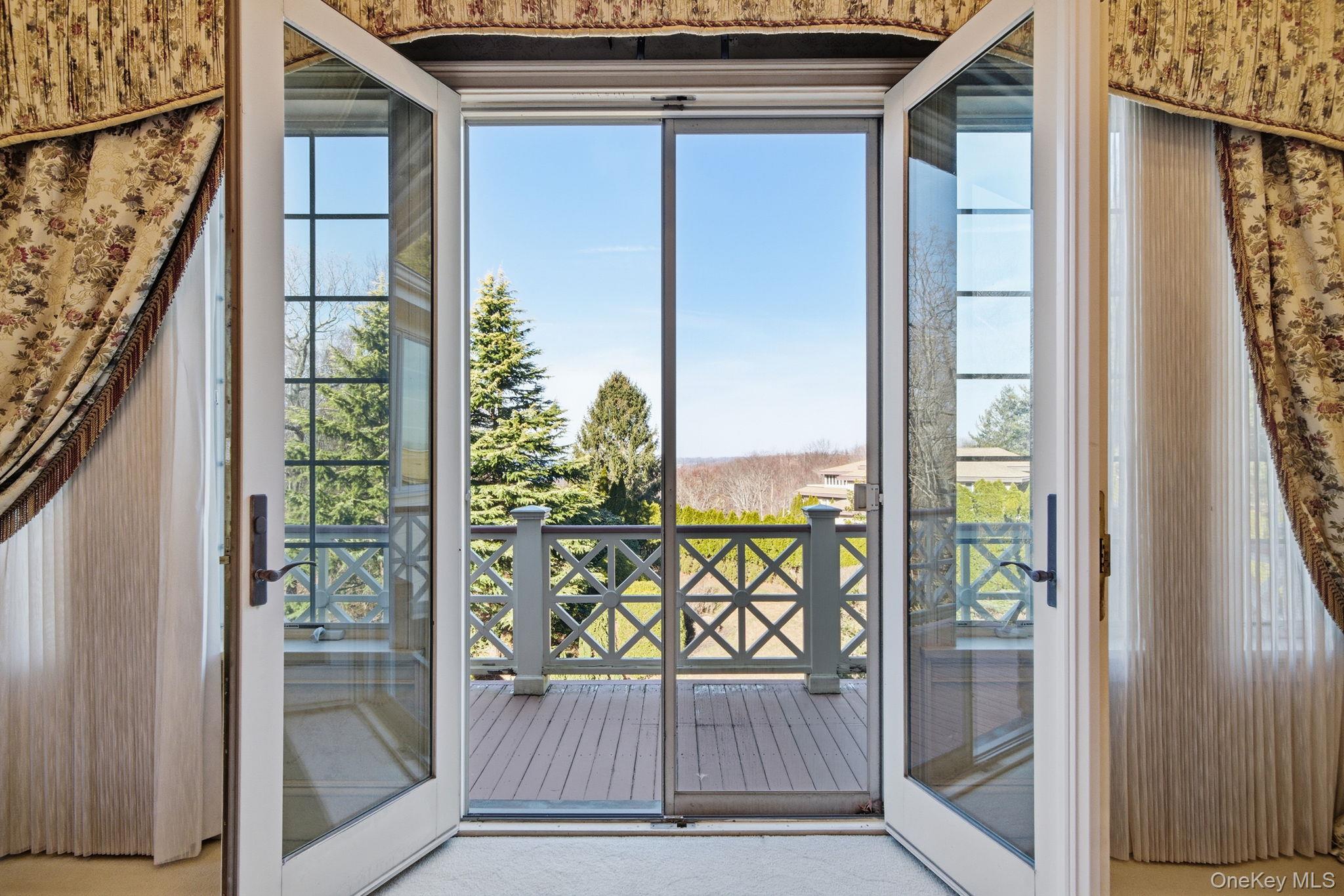19 Cobblestone Court Centerport, NY 11721 - Photo 29 of 45 a view of balcony with wooden floor