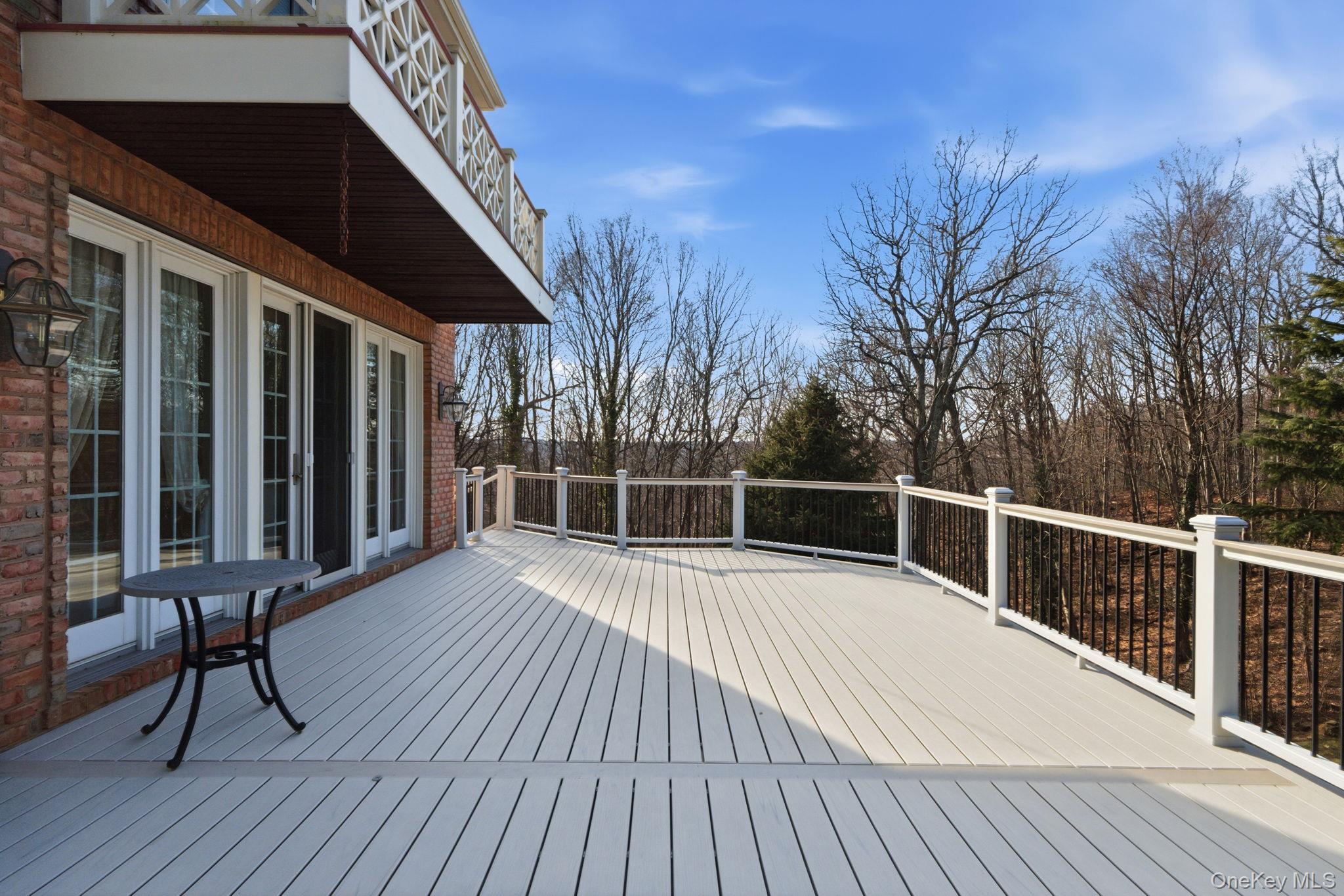 19 Cobblestone Court Centerport, NY 11721 - Photo 40 of 45 a view of balcony with wooden floor and seating space