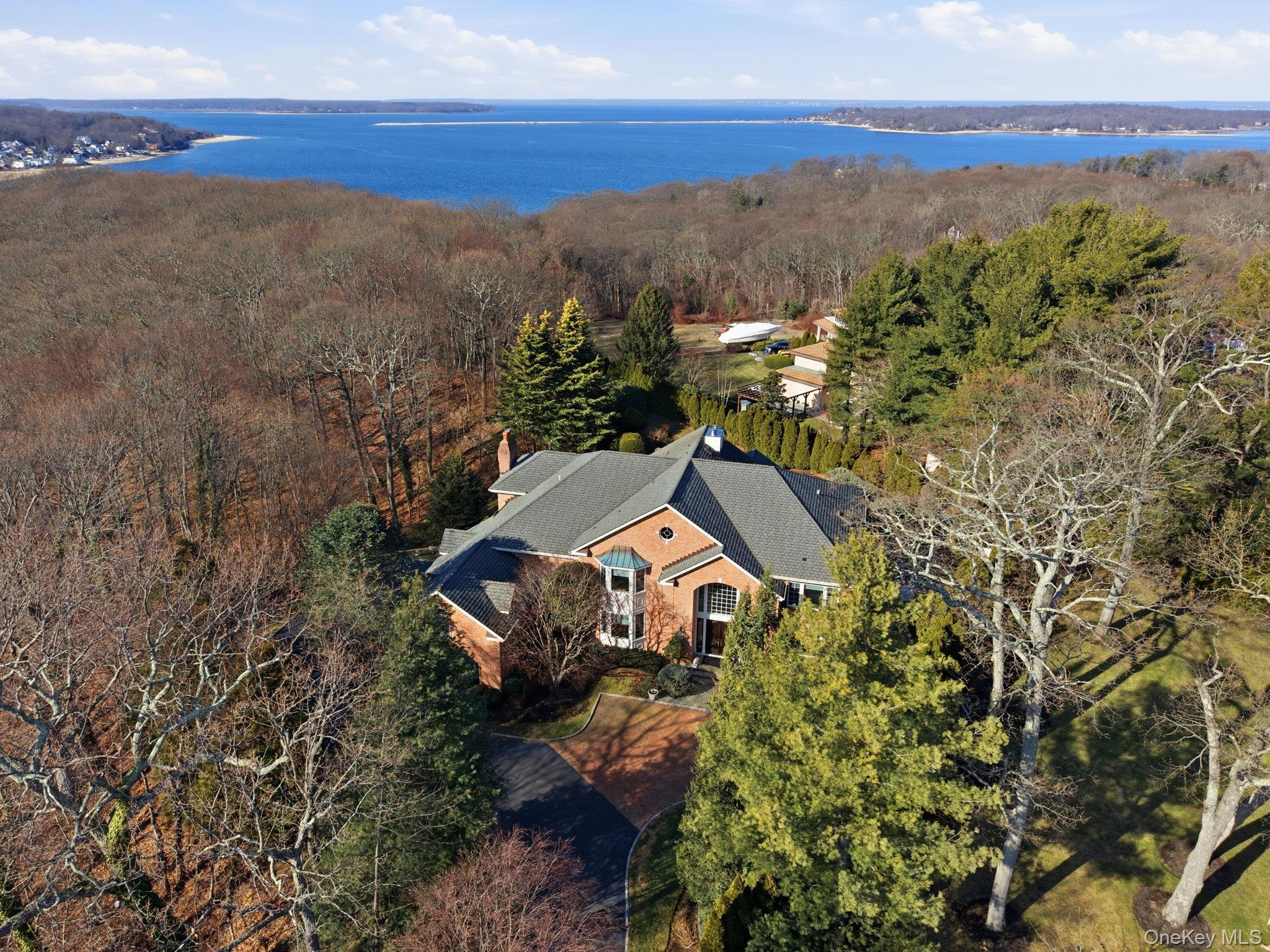 19 Cobblestone Court Centerport, NY 11721 - Photo 41 of 45 a aerial view of a house with a yard