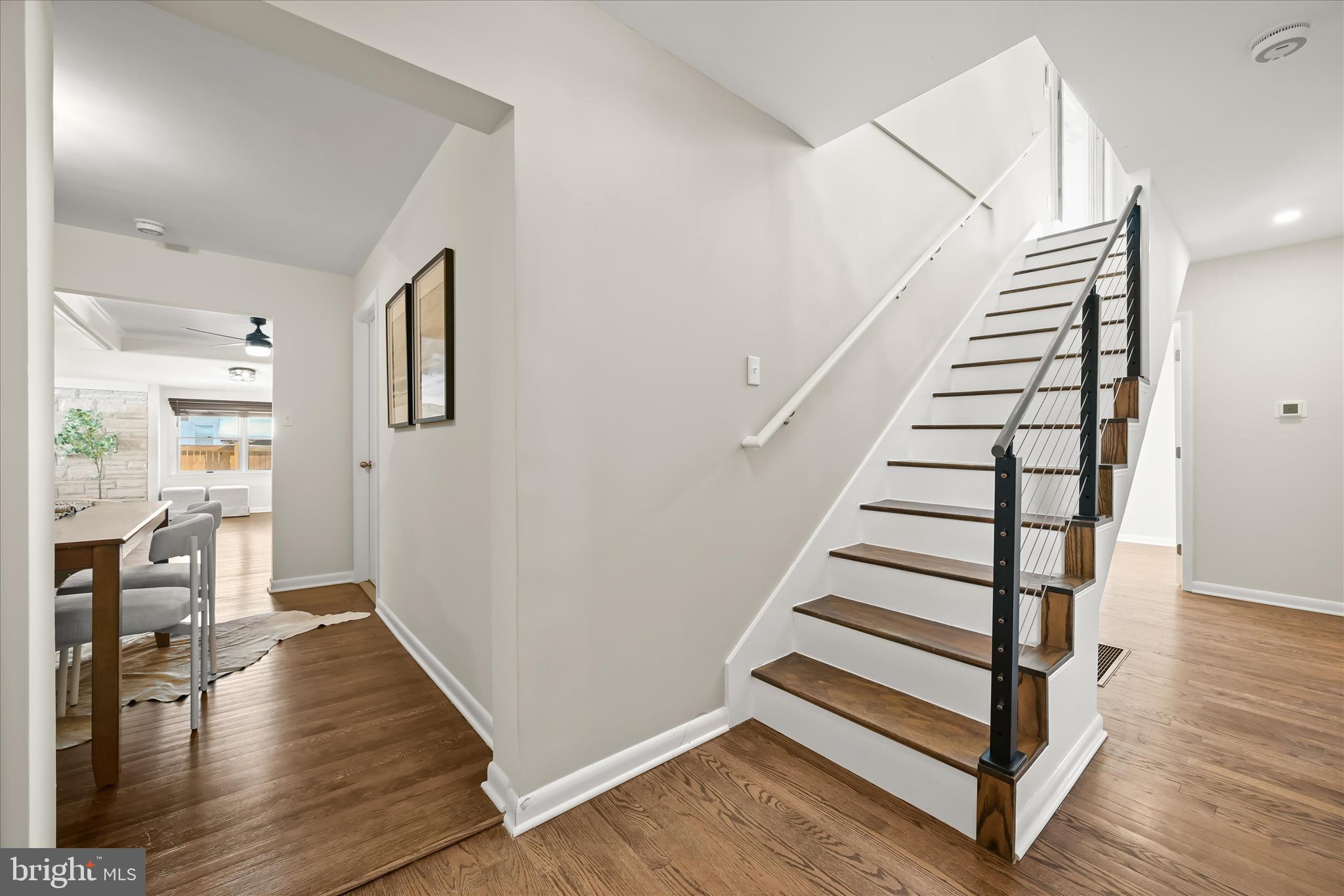 1443 Rehling Drive Edgewater, MD 21037 - Photo 25 of 54 a view of entryway with wooden floor and stairs