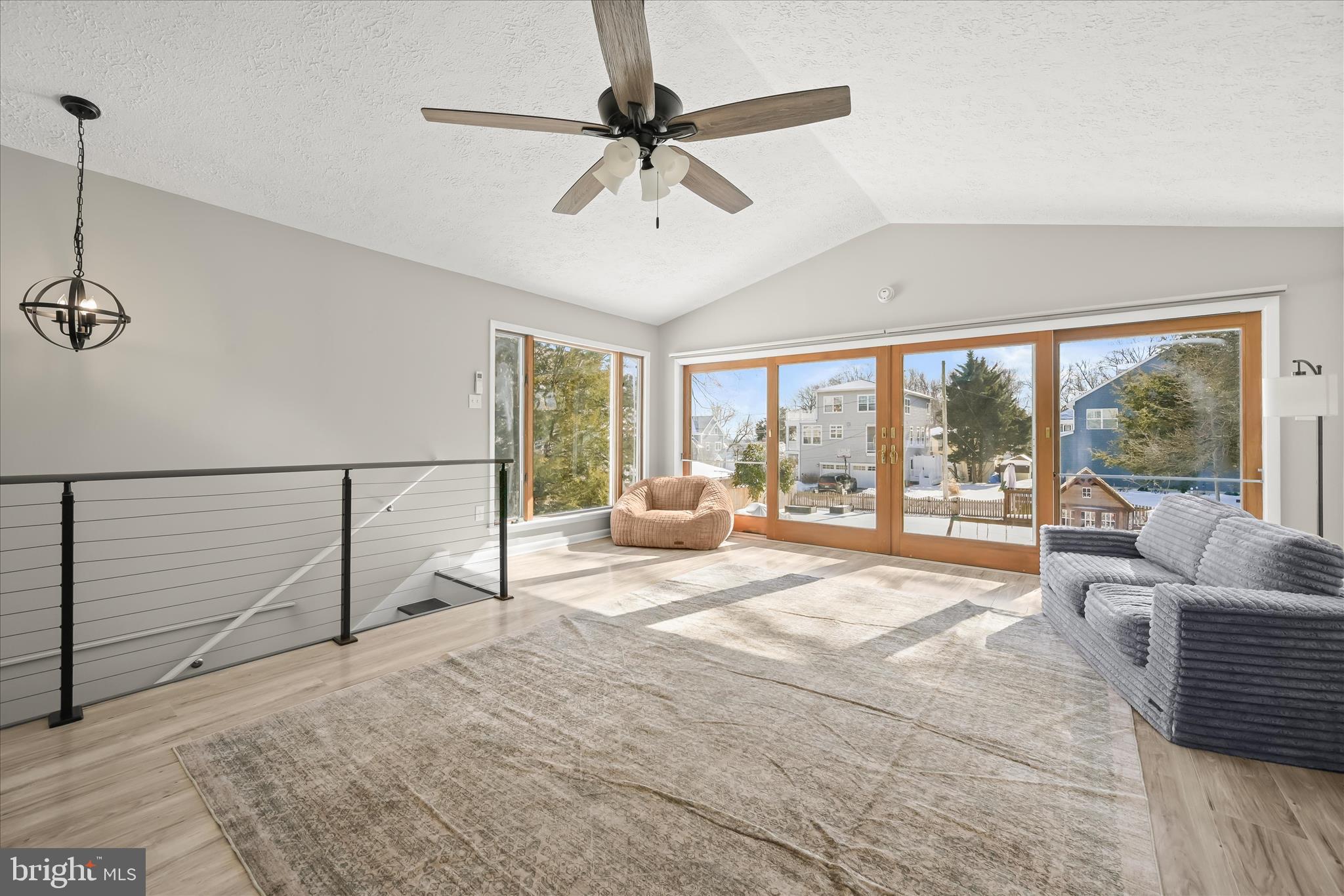 1443 Rehling Drive Edgewater, MD 21037 - Photo 27 of 54 a spacious bedroom with a large bed and a chandelier fan