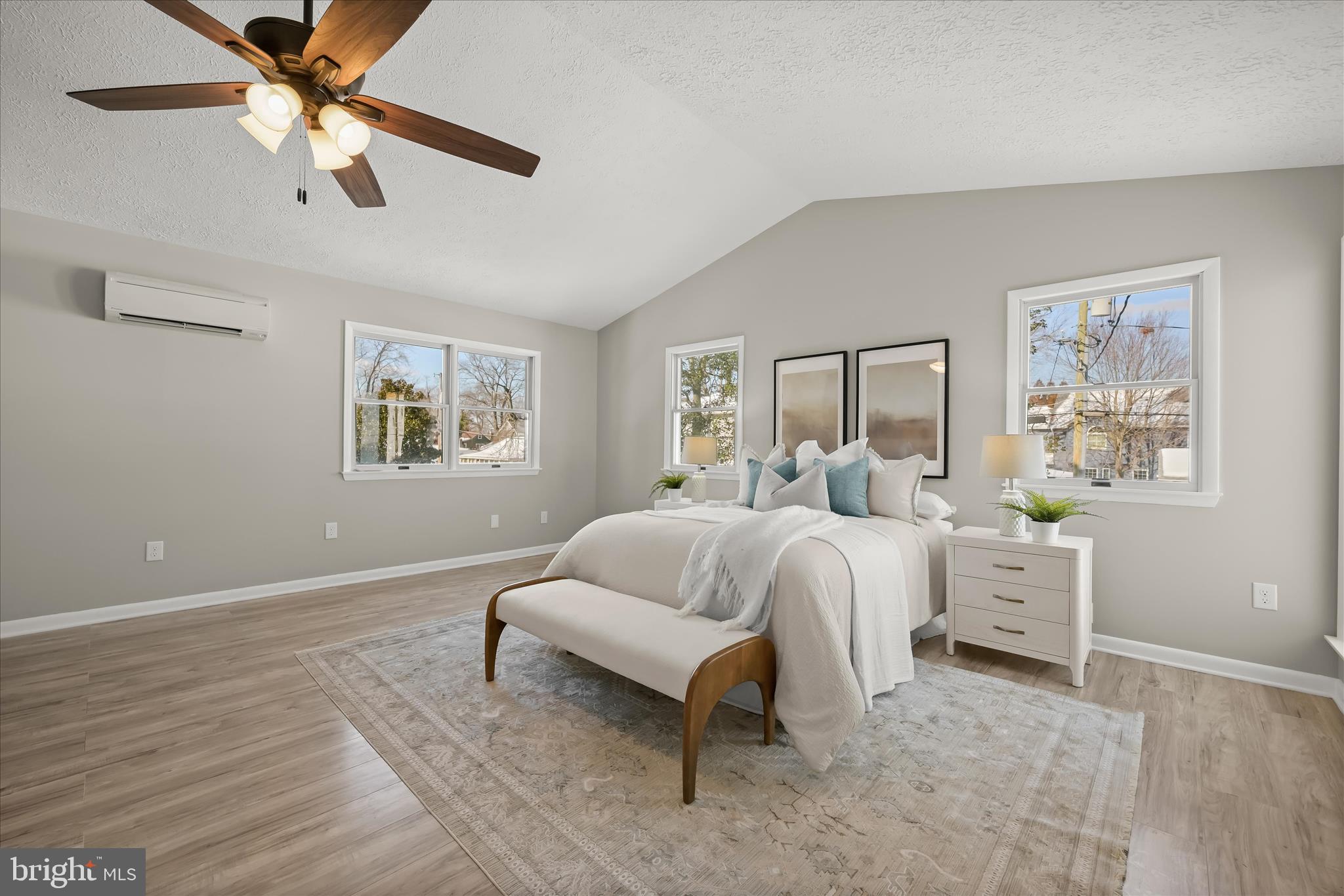 1443 Rehling Drive Edgewater, MD 21037 - Photo 29 of 54 a spacious bedroom with a bed and a chandelier