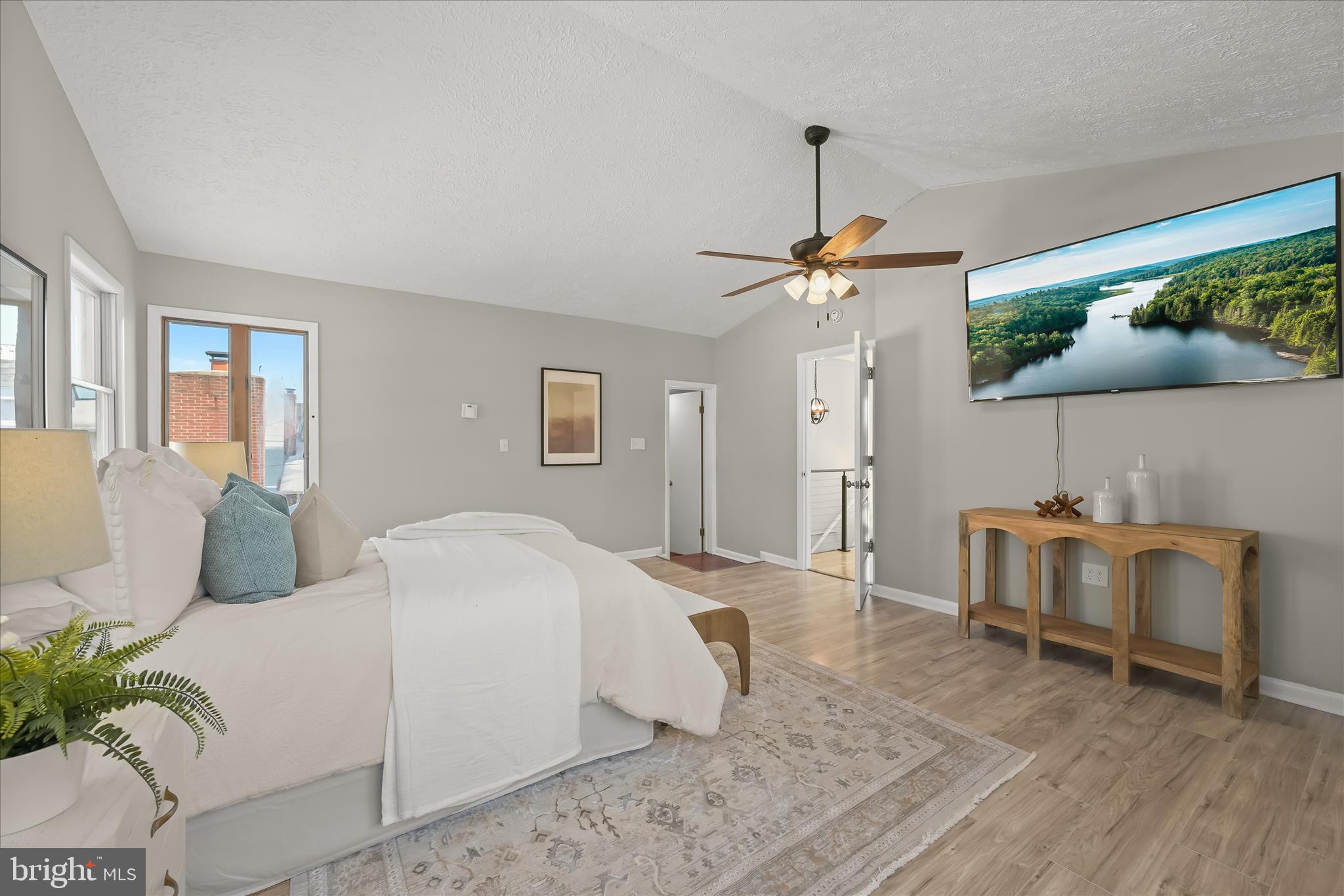 1443 Rehling Drive Edgewater, MD 21037 - Photo 31 of 54 a bedroom with a bed and a chandelier