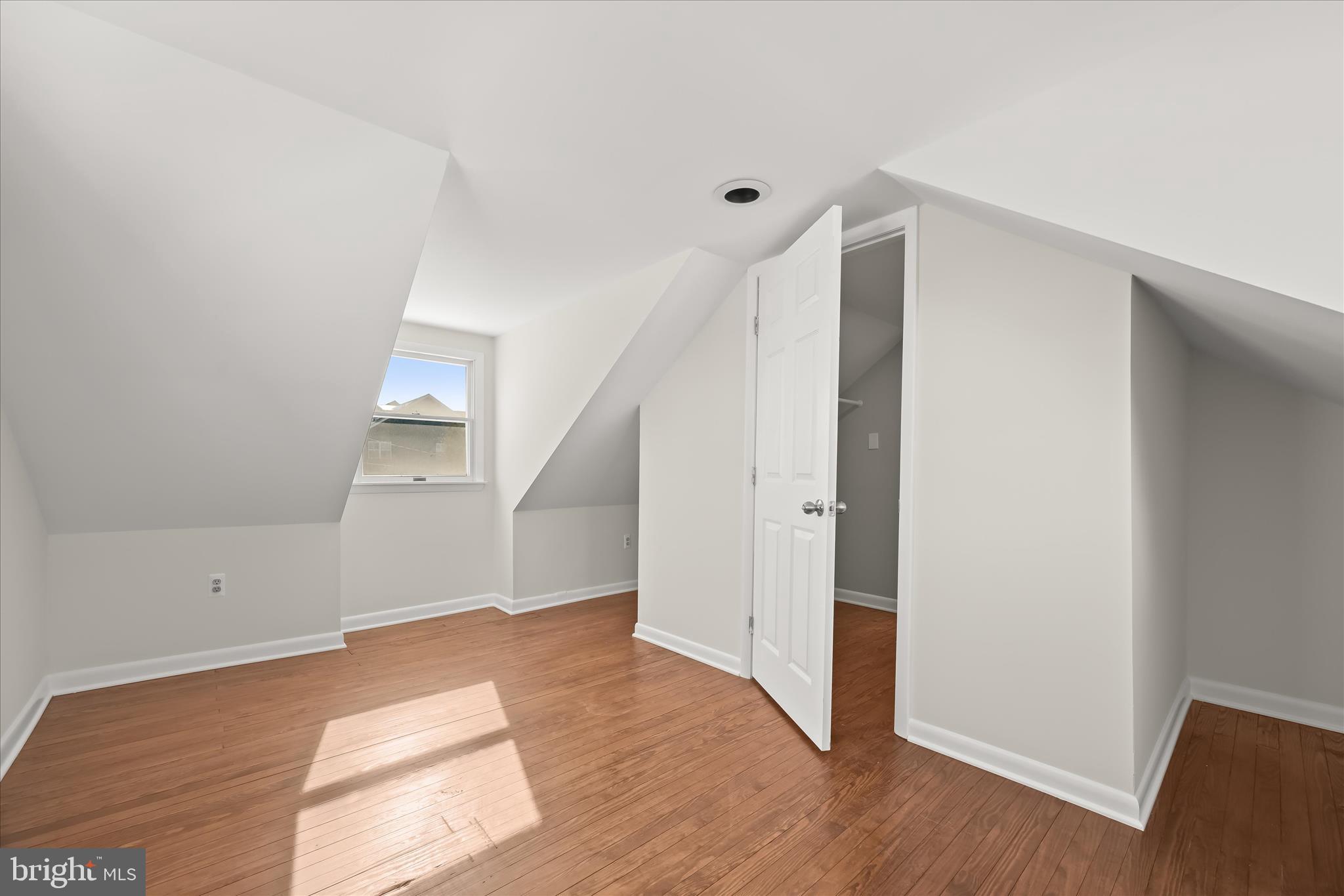 1443 Rehling Drive Edgewater, MD 21037 - Photo 36 of 54 a view of hallway with stairs and wooden floor