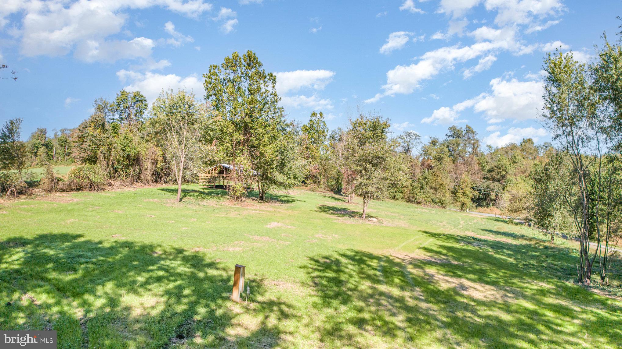 Lot 1 Davis Corner Road Street, MD 21154 - Photo 8 of 11 Serene landscape under a bright blue sky.