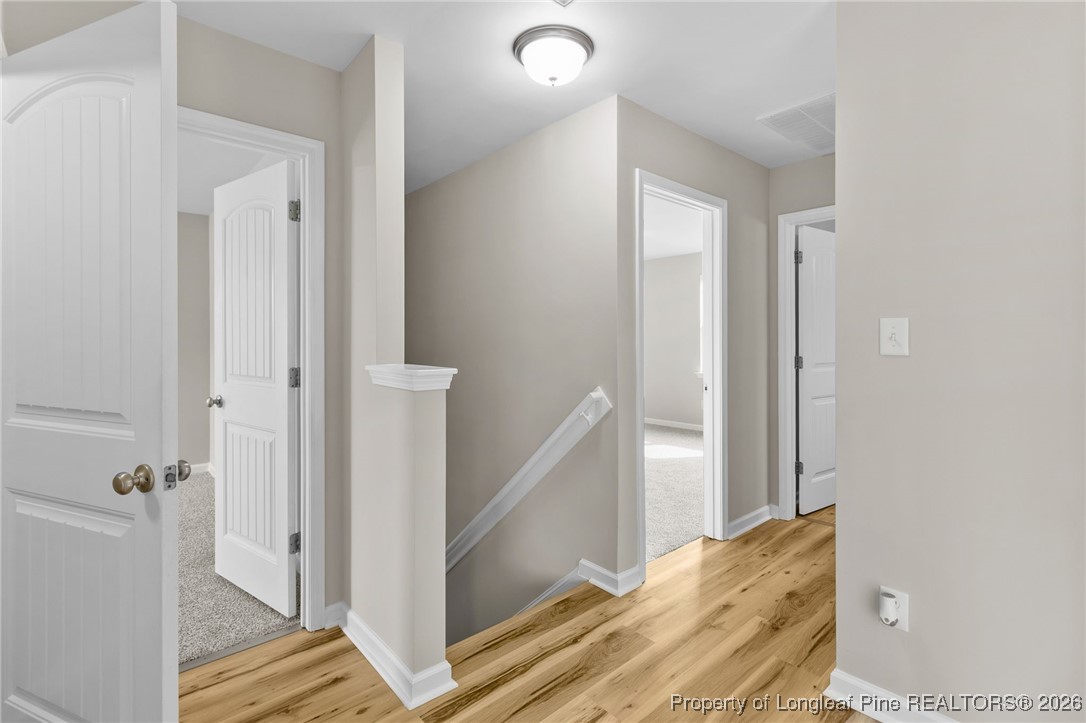 288 New Castle Lane Spring Lake, NC 28390 - Photo 19 of 39 a view of a bedroom from hallway