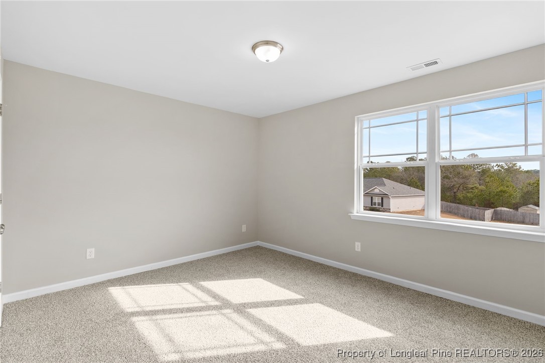 288 New Castle Lane Spring Lake, NC 28390 - Photo 26 of 39 an empty room with a window