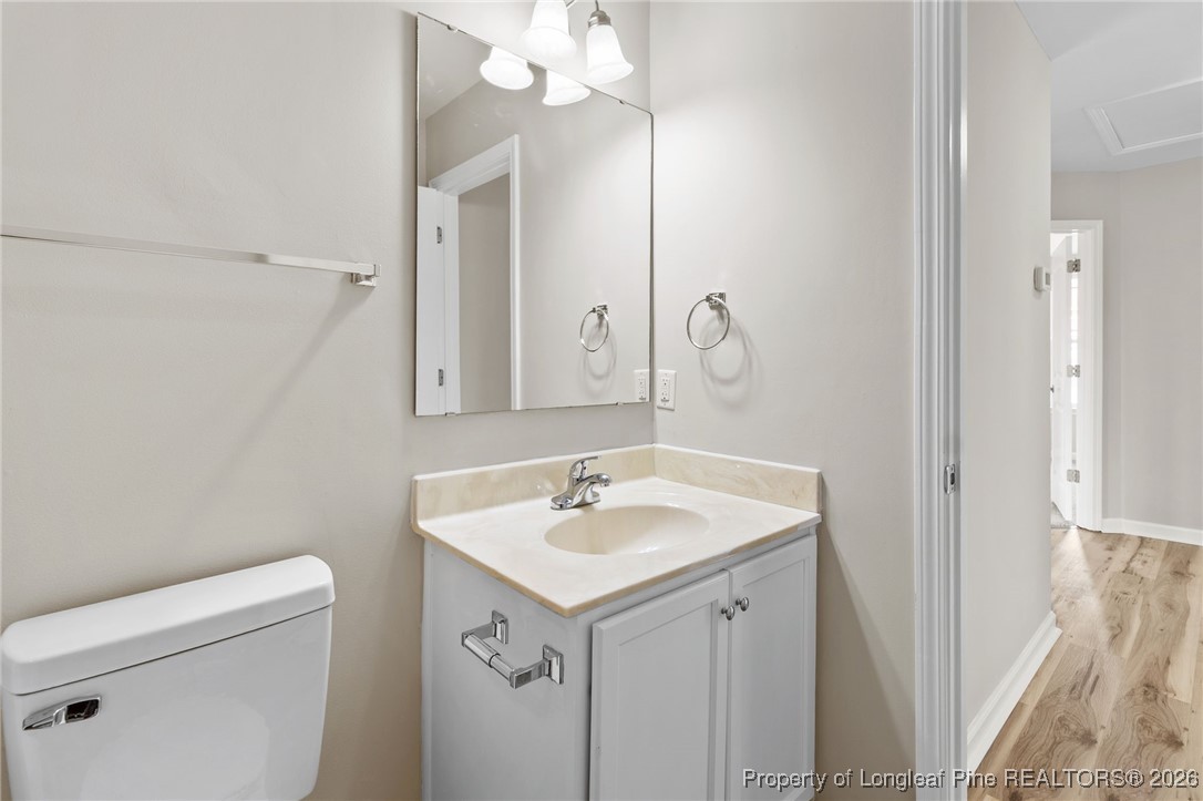 288 New Castle Lane Spring Lake, NC 28390 - Photo 32 of 39 a bathroom with a sink and a toilet