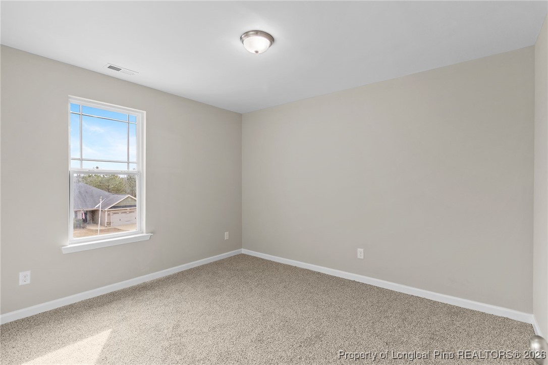 288 New Castle Lane Spring Lake, NC 28390 - Photo 33 of 39 an empty room with windows