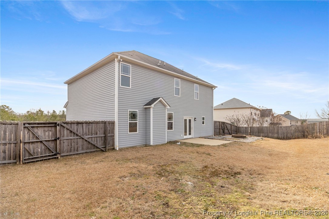 288 New Castle Lane Spring Lake, NC 28390 - Photo 36 of 39 a view of a house with a yard