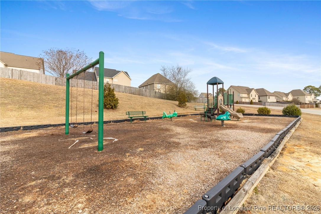 288 New Castle Lane Spring Lake, NC 28390 - Photo 39 of 39 a view of a house with a backyard