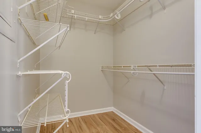 a view of a room with racks on the wall