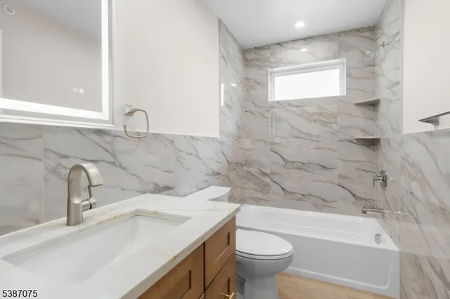 a bathroom with a sink and a bathtub
