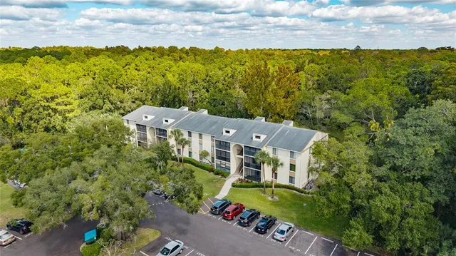 an aerial view of a house with a garden