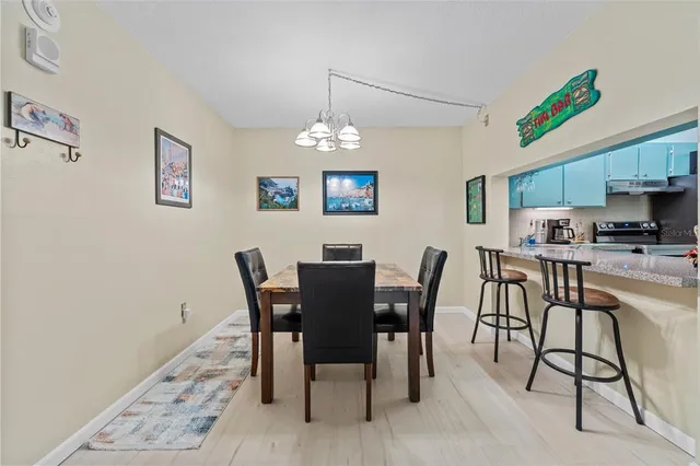 a view of a dining room with furniture