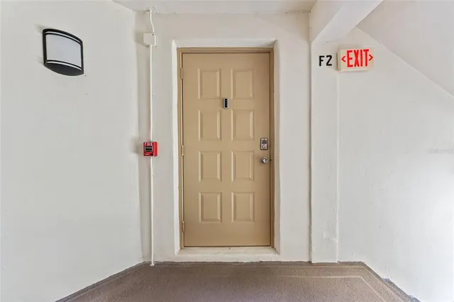 a view of a hallway with entryway