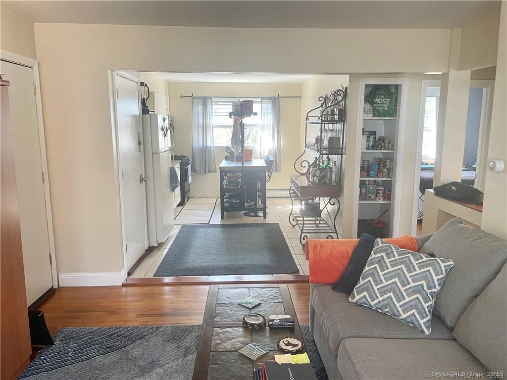 55 Oak Ridge Drive, Unit 60 New Haven, CT 06513 - Photo 6 of 16 a living room with furniture and a table
