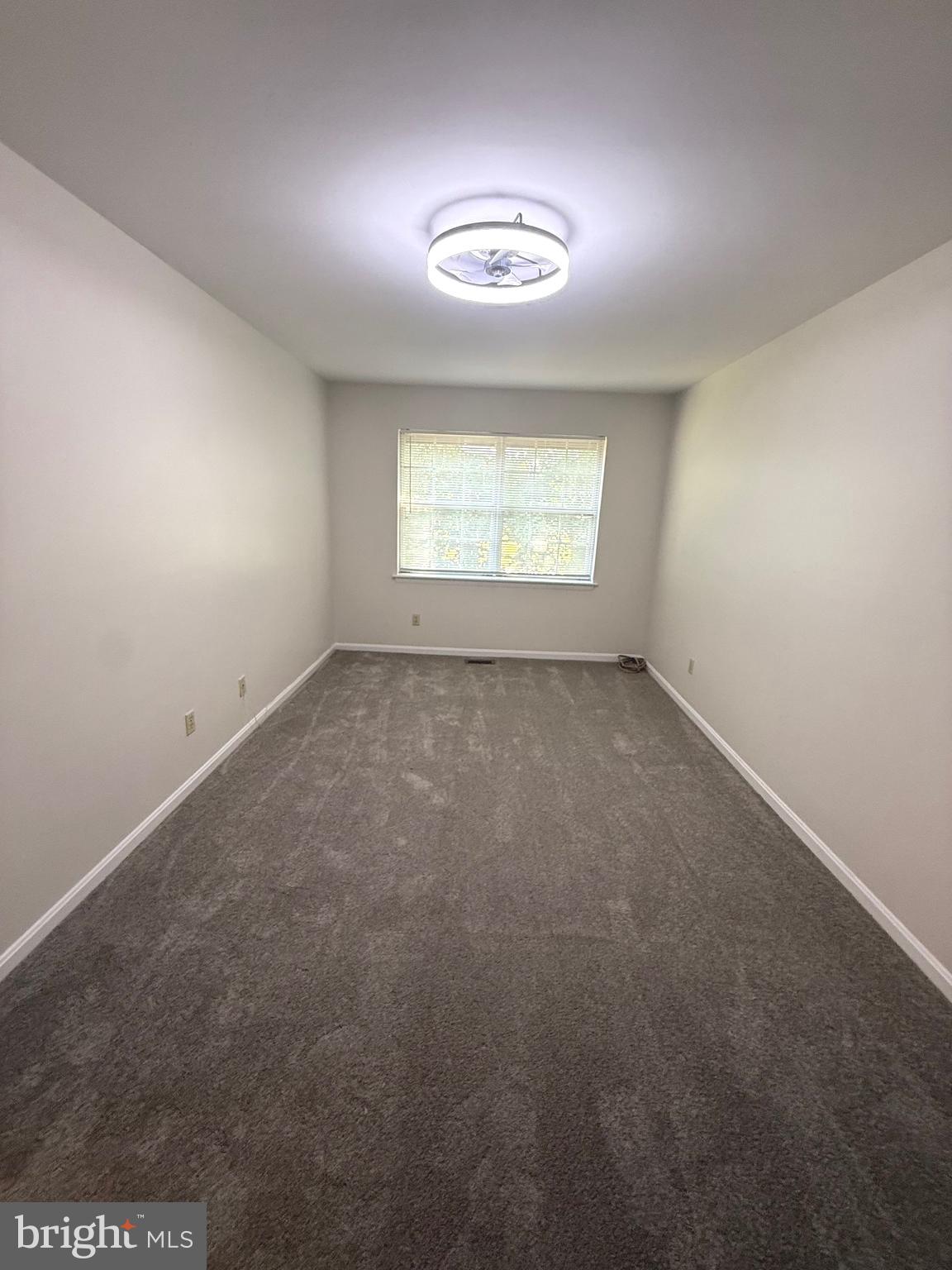 9668 Hagel Circle, Unit 34/B Lorton, VA 22079 - Photo 13 of 19 an empty room with a window