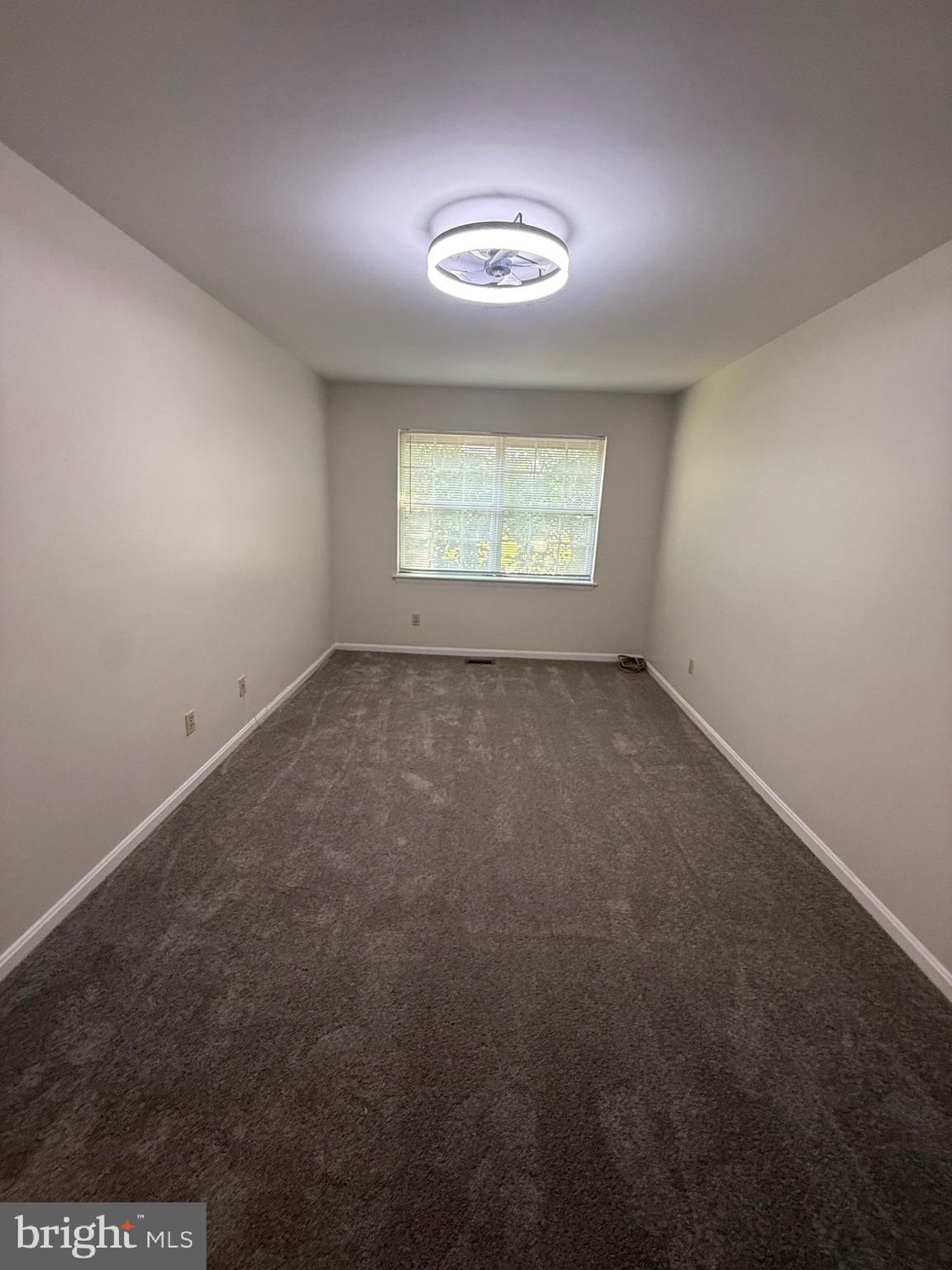 9668 Hagel Circle, Unit 34/B Lorton, VA 22079 - Photo 14 of 19 an empty room with a window