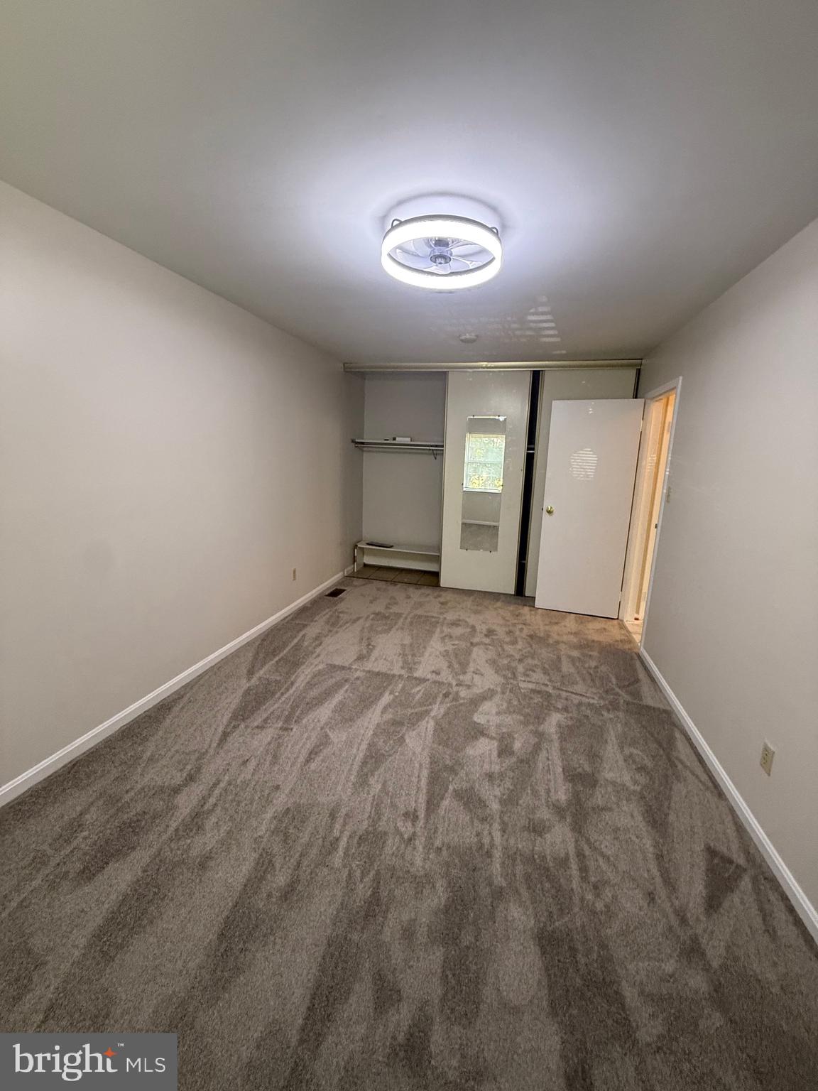 9668 Hagel Circle, Unit 34/B Lorton, VA 22079 - Photo 15 of 19 an empty room with a empty space and a window