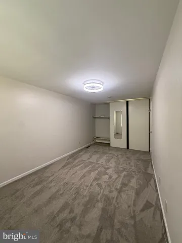 an empty room with a natural light