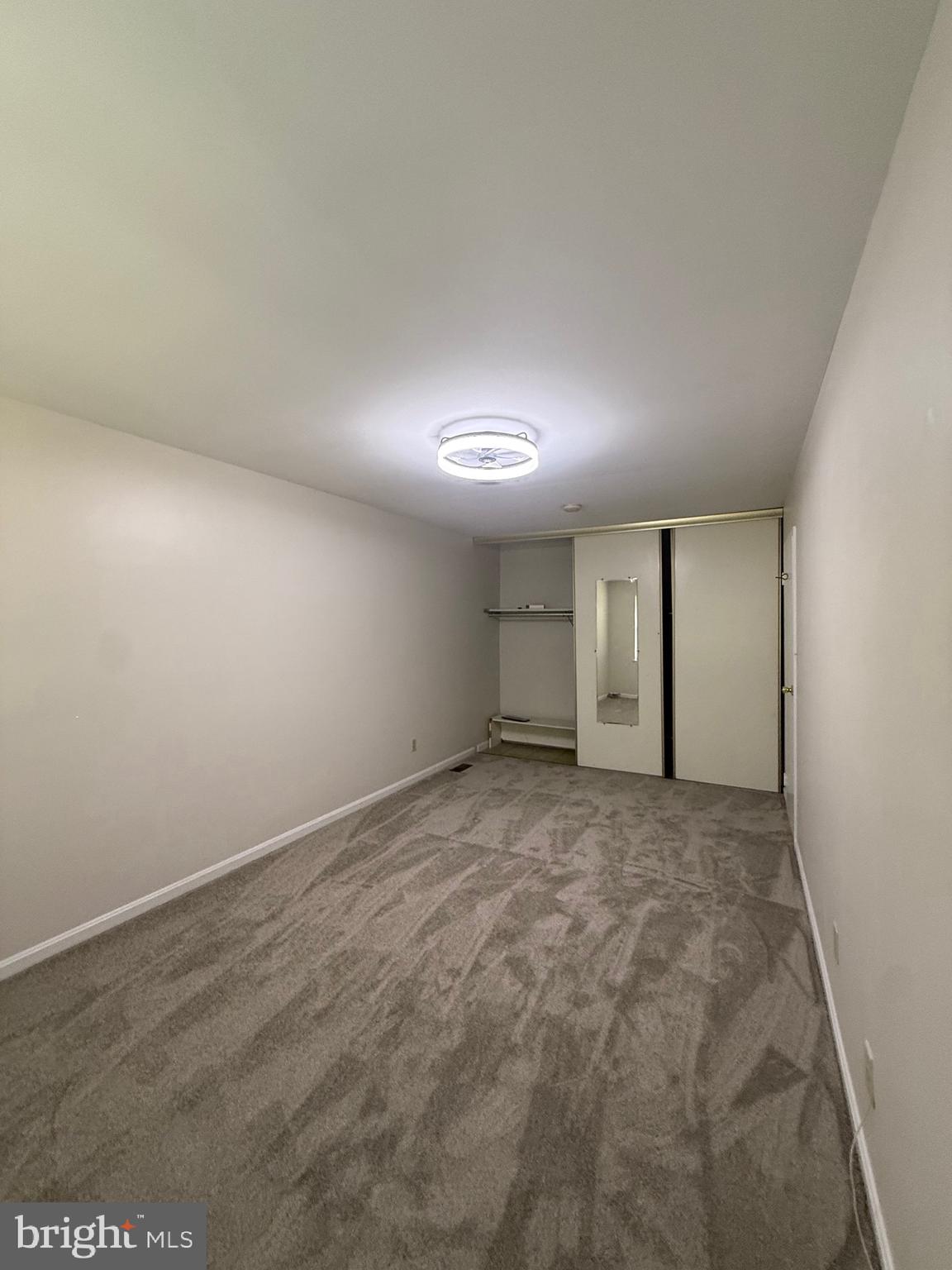 9668 Hagel Circle, Unit 34/B Lorton, VA 22079 - Photo 17 of 19 an empty room with a natural light