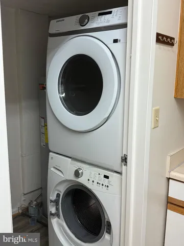 a view of a hallway with washer and dryer