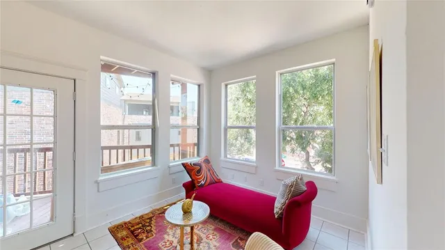 a living room with furniture and a window