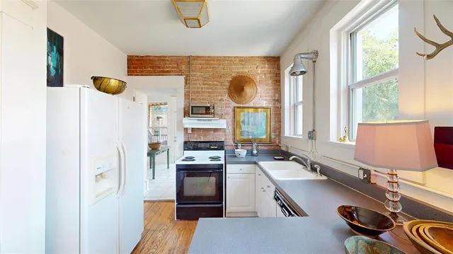 a room with a window and gym equipment