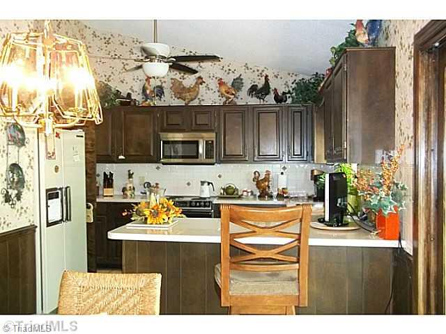 2727 Pleasant Ridge Road Summerfield, NC 27358 - Photo 5 of 16 Kitchen.