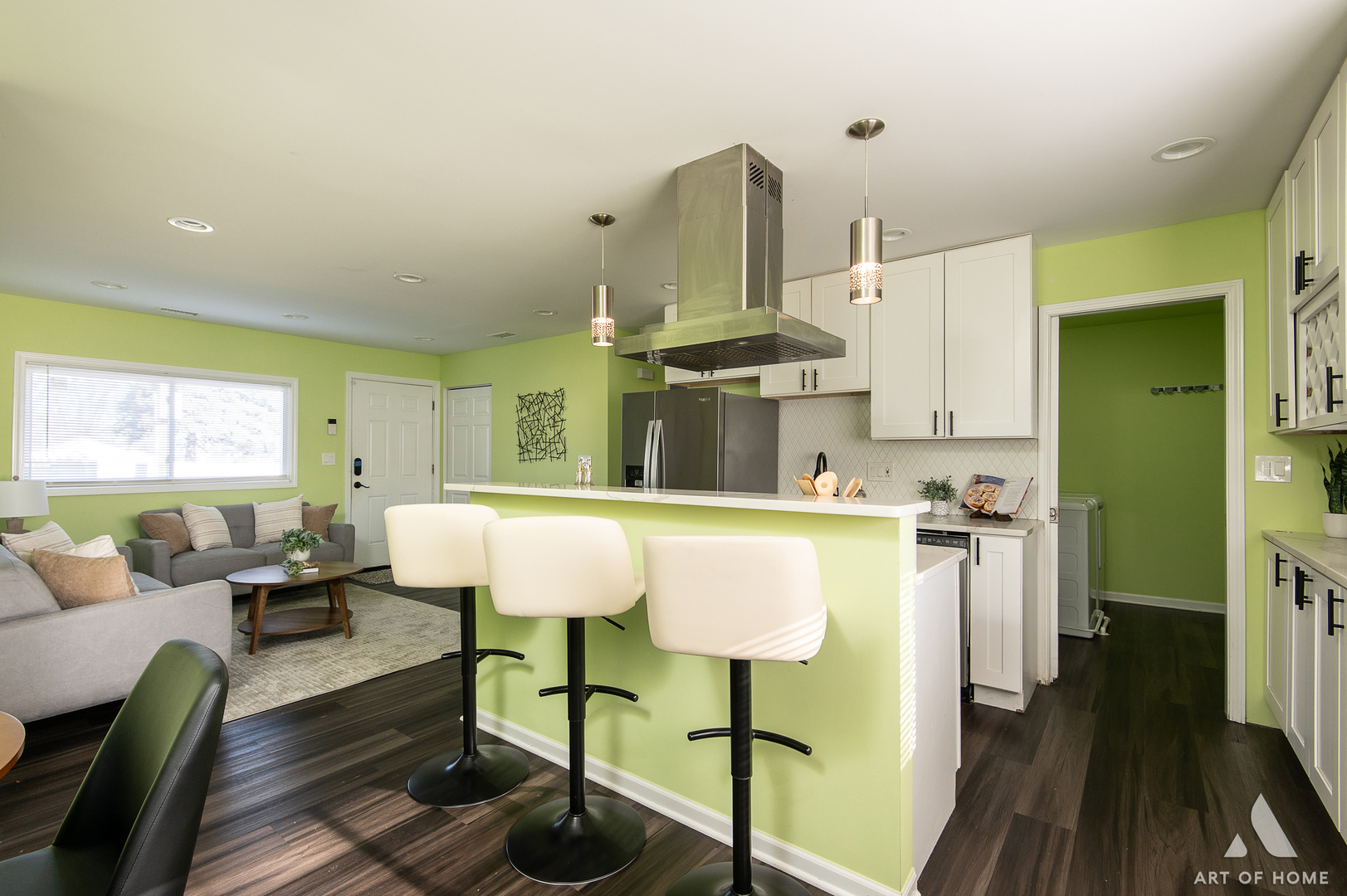 703 Yates Avenue Romeoville, IL 60446 - Photo 11 of 44 a living room with stainless steel appliances furniture a rug and a kitchen view
