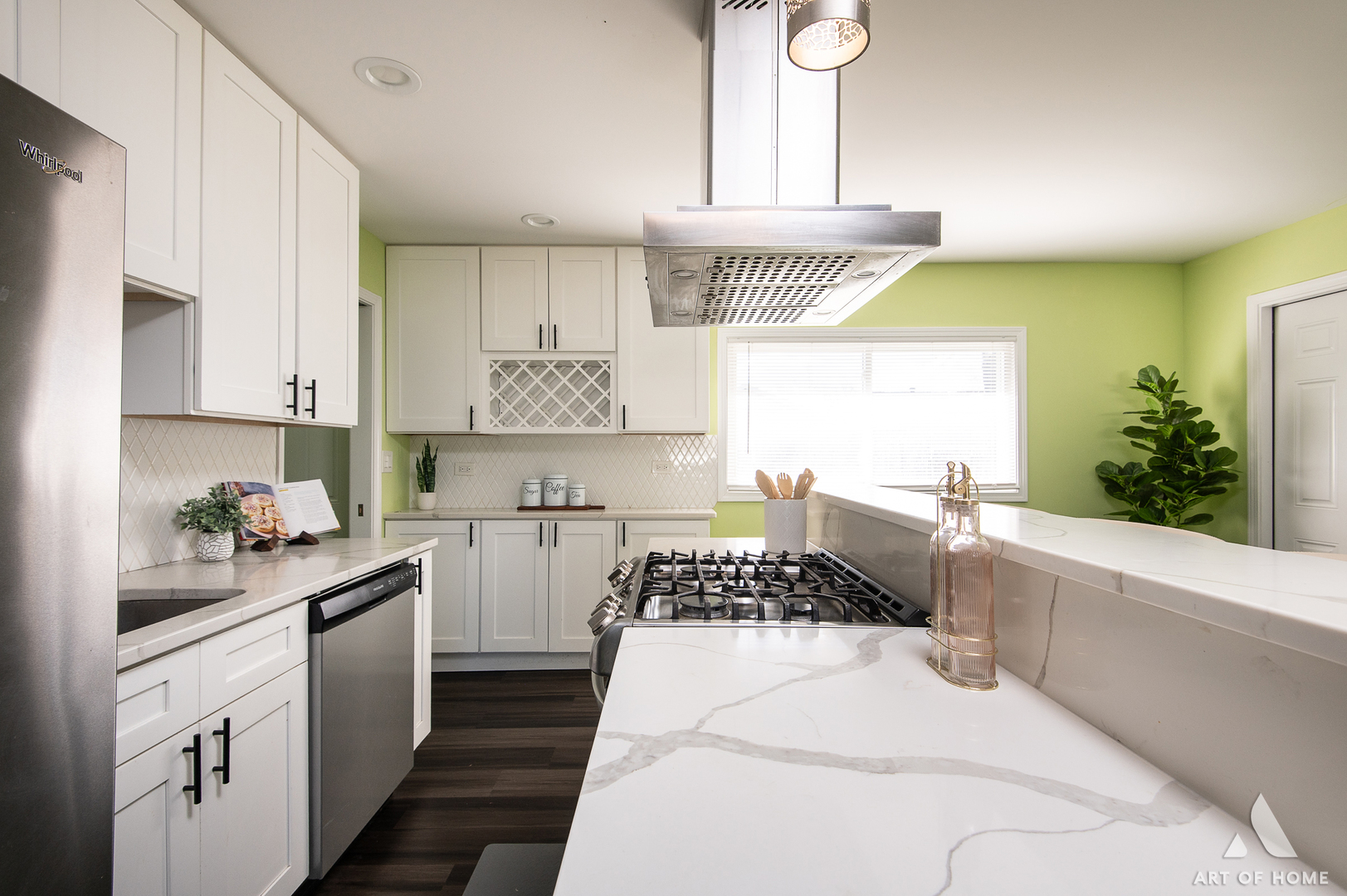 703 Yates Avenue Romeoville, IL 60446 - Photo 5 of 44 a kitchen with a sink a stove cabinets and a window