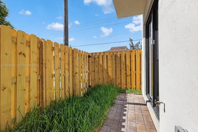 a view of a bathroom with shower and garden