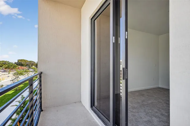 a view of a balcony with city view