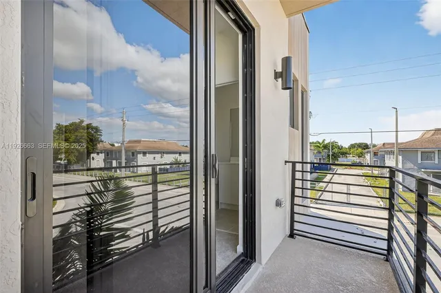 a view of a balcony with city view