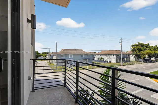 a view of a house with a swimming pool