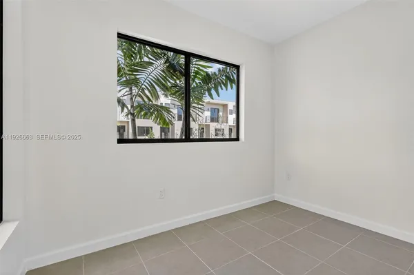 an empty room with a window