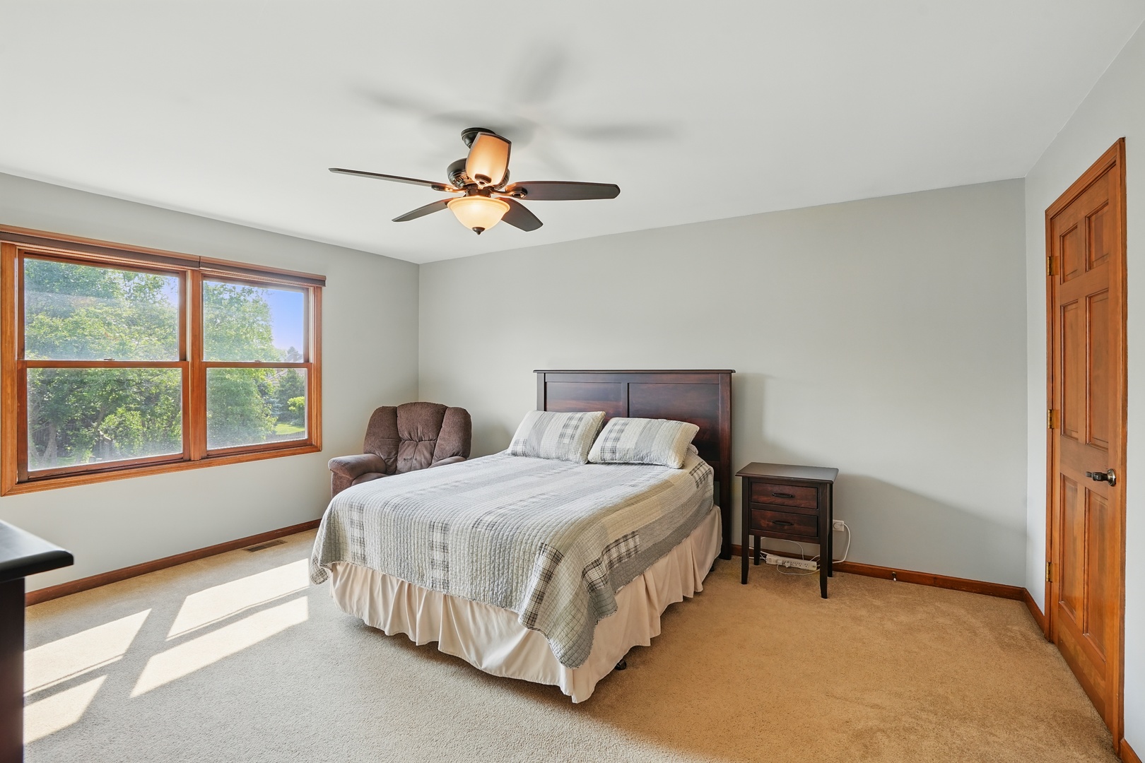 1844 Slippery Rock Road Naperville, IL 60565 - Photo 14 of 39 a bedroom with a bed and a window