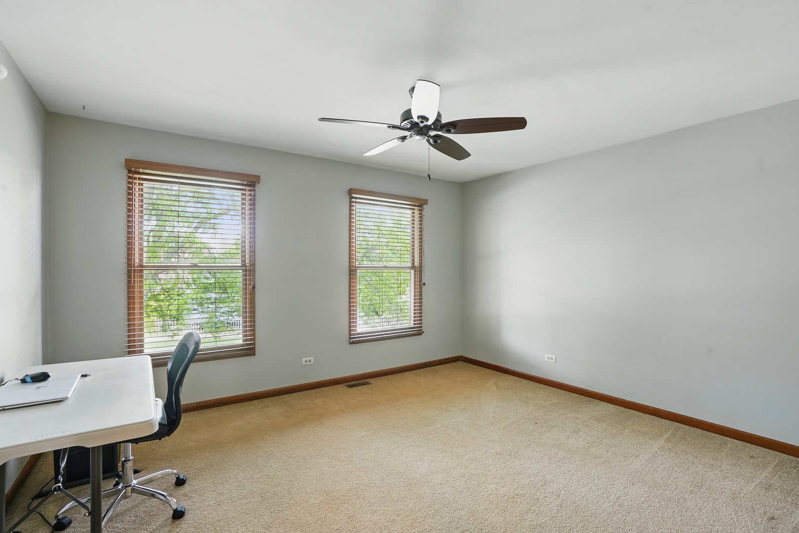 1844 Slippery Rock Road Naperville, IL 60565 - Photo 15 of 39 a view of room with windows and ceiling fan