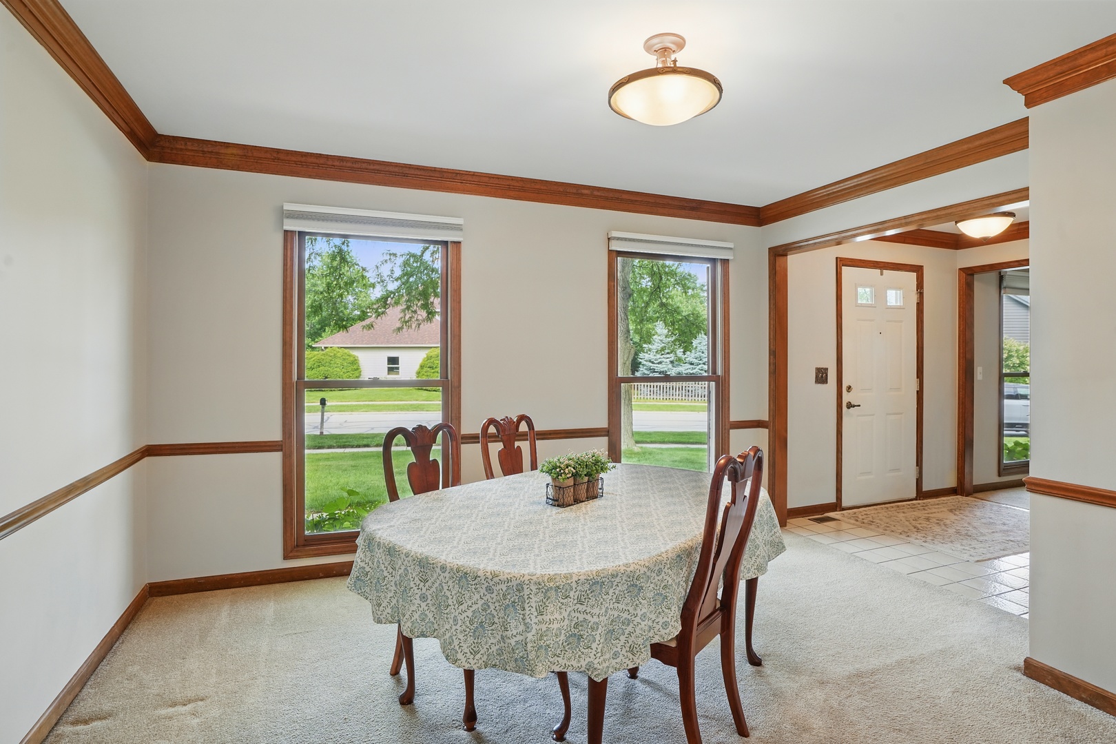 1844 Slippery Rock Road Naperville, IL 60565 - Photo 18 of 39 a view of a dining room with furniture window and outside view