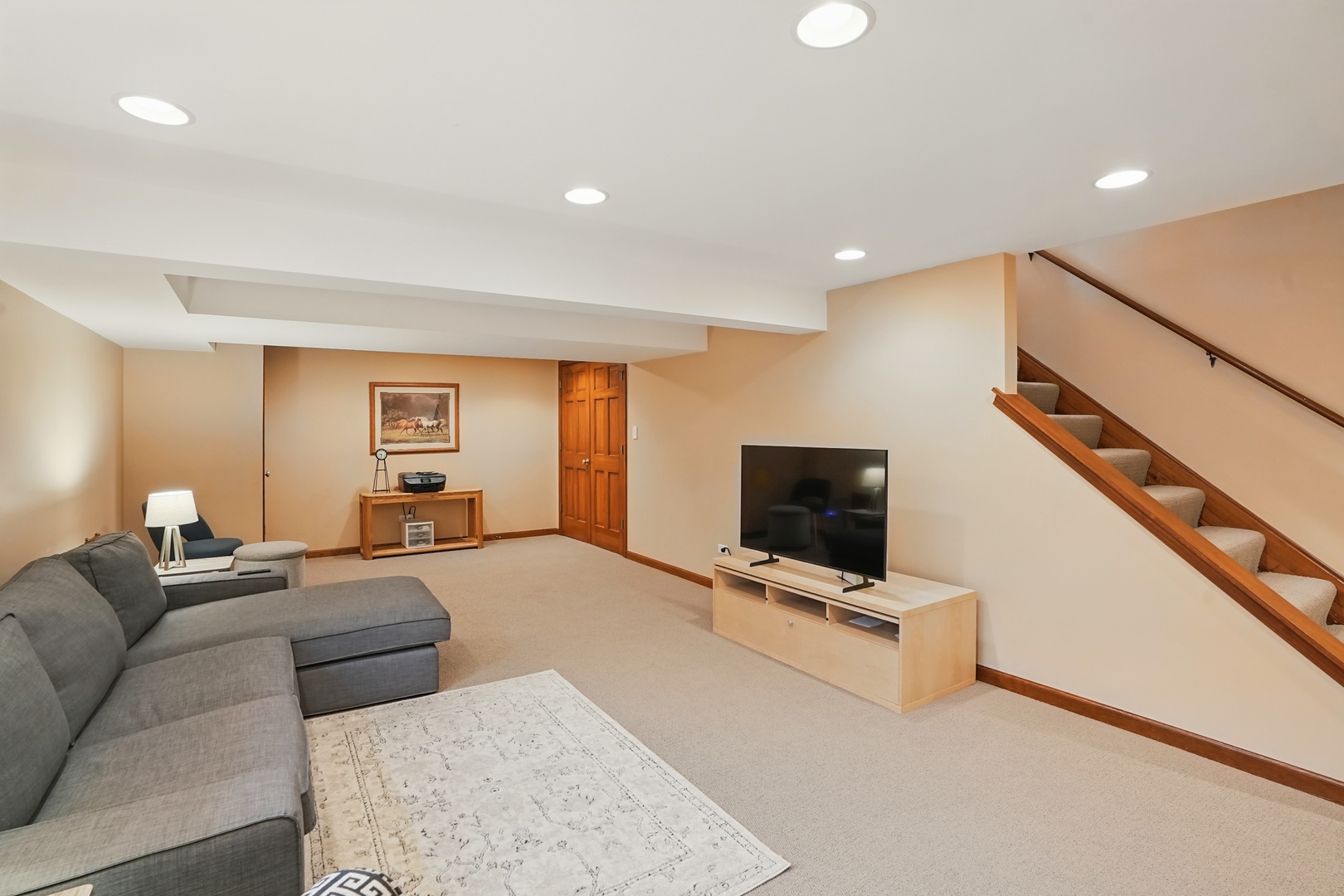 1844 Slippery Rock Road Naperville, IL 60565 - Photo 25 of 39 a living room with furniture and a flat screen tv