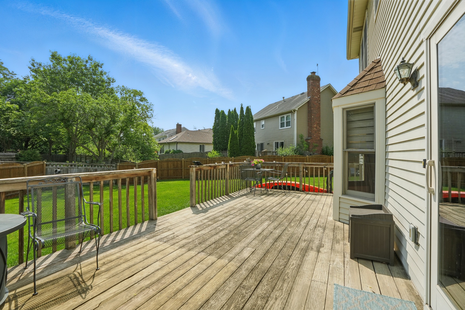 1844 Slippery Rock Road Naperville, IL 60565 - Photo 26 of 39 a view of balcony with deck and wooden floor