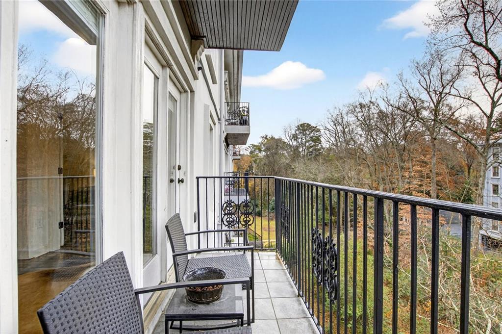 3203 Lenox Road Northeast, Unit 32 Atlanta, GA 30324 - Photo 31 of 38 a view of balcony with furniture